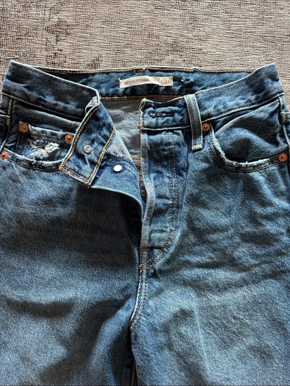 Levi rib cage straight ankle size 26 reworked knee patch detail